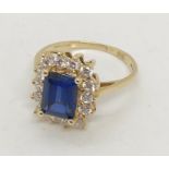 A 14ct gold sapphire and CZ cluster ring