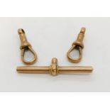 A Victorian 9ct rose gold T bar along with two 9ct gold clips, total weight 8.5g