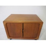 A tambour fronted mid-century entertainment cabinet