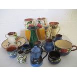 A collection of Torquay Ware pottery