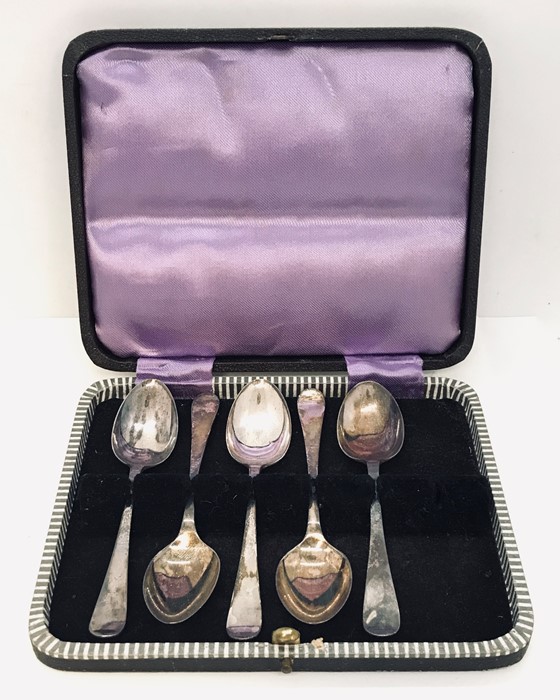 A cased hallmarked set of silver coffee spoons