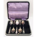 A cased hallmarked set of silver coffee spoons