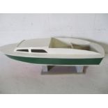 A wooden model of a speedboat, 85cm length