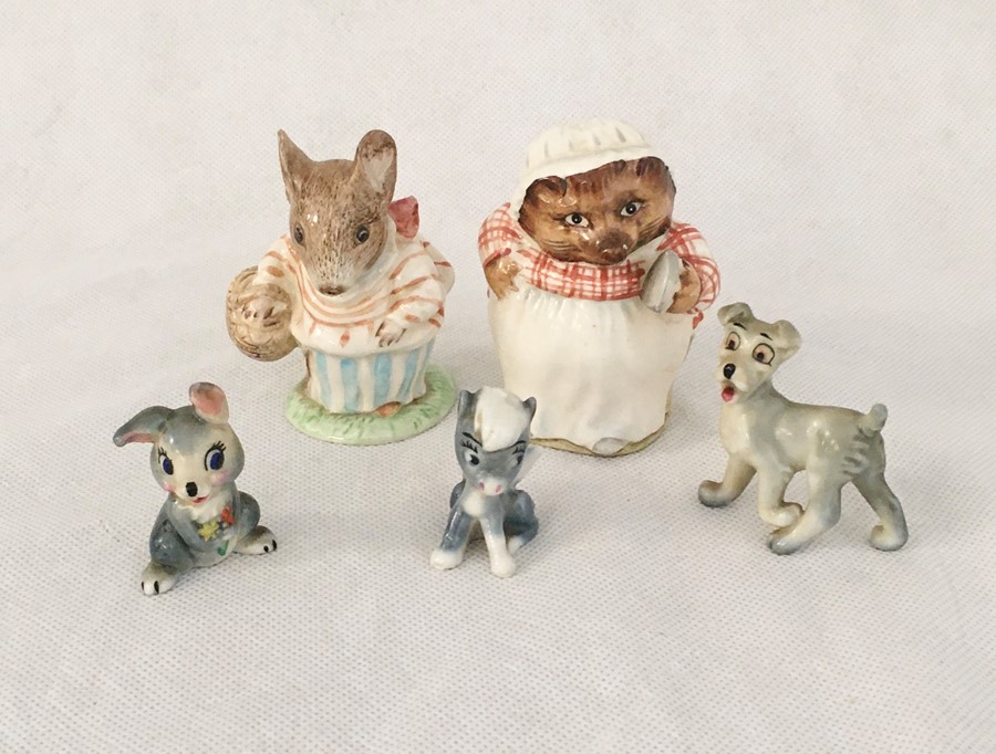 Two Beatrix Potter Royal Albert figurines along with three Wade Disney figures