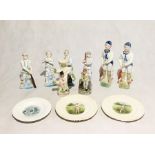 A collection of cricket themed figures and plates including Staffordshire etc.