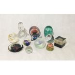 A collection of paperweights including Kosta Boda etc.