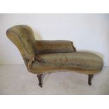 A Victorian button back chaise longue on cabriole legs