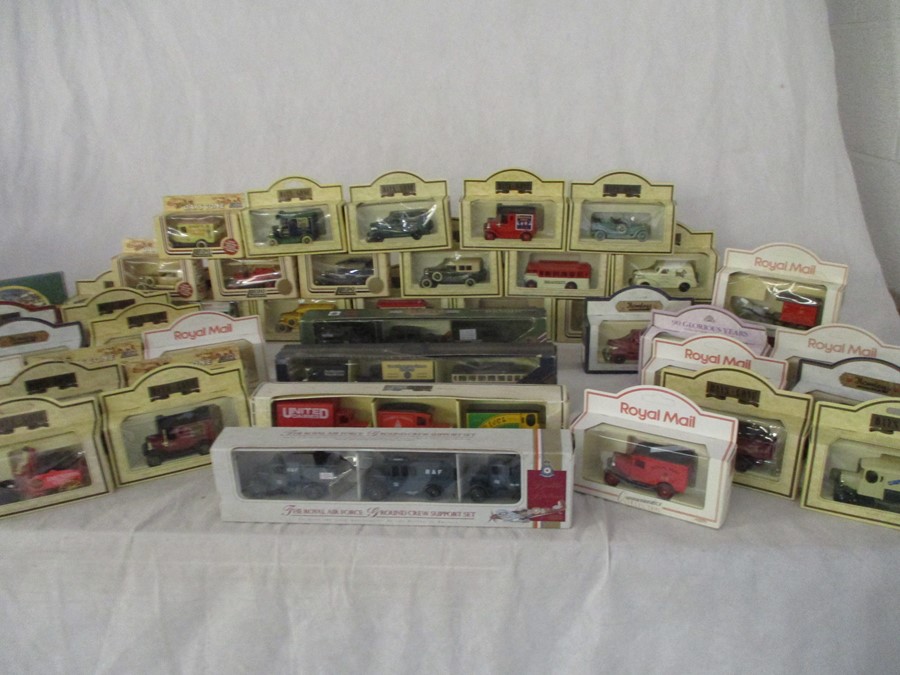 A collection of mainly boxed Lledo die-cast vehicles including "Days Gone"