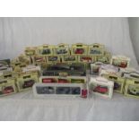 A collection of mainly boxed Lledo die-cast vehicles including "Days Gone"