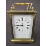 A brass carriage clock ( appears to be working)