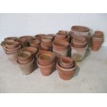 A collection of various sized terracotta pots. (Over two boxes)