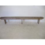 A long rustic bench - overall length 300cm