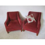 A pair of upholstered armchairs