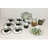 A collection of Denby including a coffee set, mugs etc.