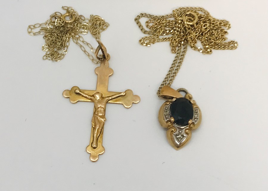 A 9ct gold Crucifix on fine chain, a 9ct gold sapphire and diamond pendant on chain and an SCM - Image 2 of 3