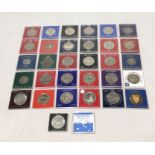 A collection of cased commemorative crowns