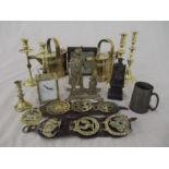 A collection of various brass ware etc. including watering cans, candlesticks etc.