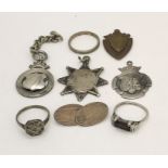 A small collection of silver jewellery, medallions etc.