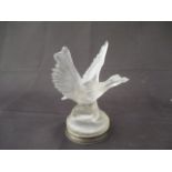 A frosted glass car bonnet ornament in the form of a duck in flight. Height 15cm