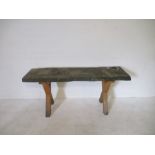 A live edged garden table on X framed base - length 182cm height 80cm width 61cm