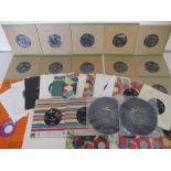 A collection of thirty six 7" vinyl singles by The Beatles including Yesterday, Hey Jude, Help,