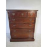 A Victorian style chest of seven drawers.