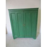 An Irish pine green painted larder cupboard - H153cm W122cm D59cm.