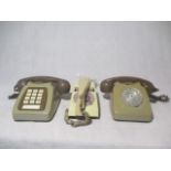 Three vintage telephones, two rotary plus one push button.