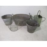 A collection of galvanised items included a watering can, two buckets, a two handled bath dated 1950
