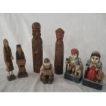 A collection of carved wooden figures along with a Danish carved chalk figure of an accordion