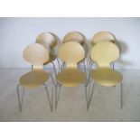 A harlequin set of contemporary ply and chrome dining chairs - possibly ARAM.