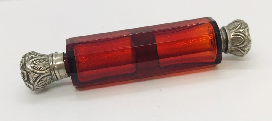 A Victorian double ended cranberry scent bottle, hinge A/F