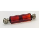 A Victorian double ended cranberry scent bottle, hinge A/F