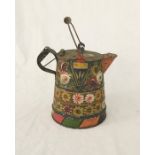 A 19th Century tole ware type barge jug with hand painted floral decoration, height 26.5 cm not