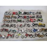 A collection of thirty six model motorcycles including Maisto etc