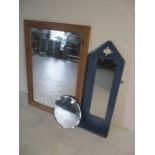 A collection of three mirrors including a large pine framed mirror (104cm x 73cm), a blue framed