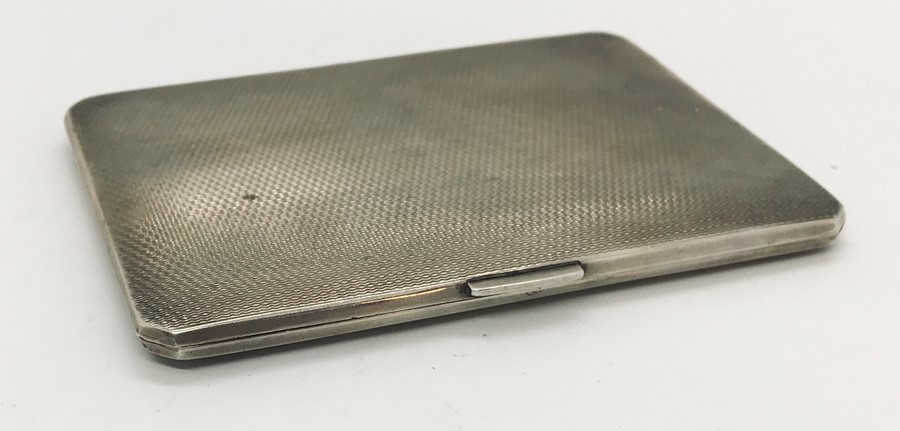 A heavy hallmarked silver cigarette case, weight 183.2g