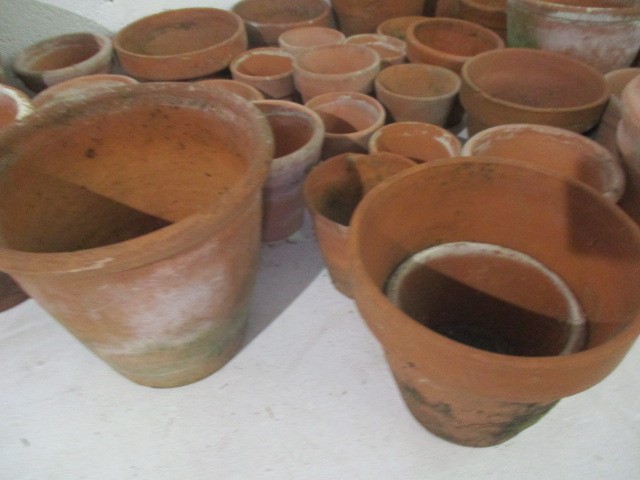 A large collection of terra cotta pots. - Image 7 of 7
