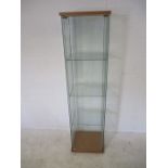 A glass display cabinet - no lock