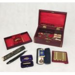 A leather jewellery box (A/F) containing a cut throat razor, extendable button hook, Volupte (USA)