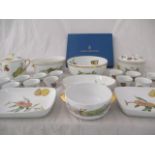 A collection of Royal Worcester Evesham including serving dishes, cake plate, lidded pot, ramekins.