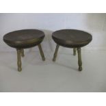 A pair of Middle Eastern brass dished circular stool, pierced and embossed in the Persian taste with