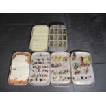Three Wheatley cases of various fishing fly's
