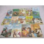A collection of 14 Ladybird books including The Wizard of Oz, The Elves and the Shoemaker, Three
