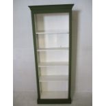 A painted green and white bookcase - height 193cm, width 76cm, depth 32cm