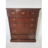 A Victorian style chest of seven drawers. Width 104cm Height 130cm Depth 56cm