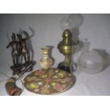 An miscellaneous assortment of items including a gas lamp with shades, Chinese Satsuma ware etc