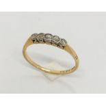 An 18ct gold five stone diamond ring