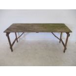 A wooden trestle table