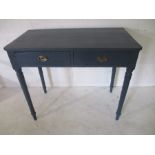 A painted Victorian side table with two drawers